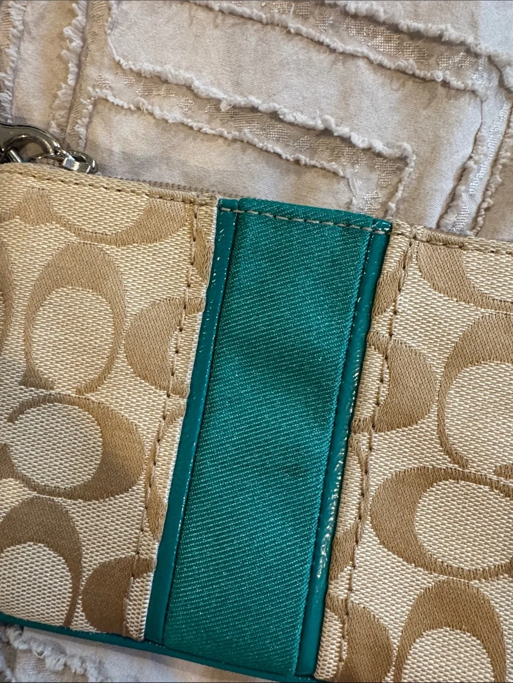 Coach Beige Signature Wristlet with Teal Accent